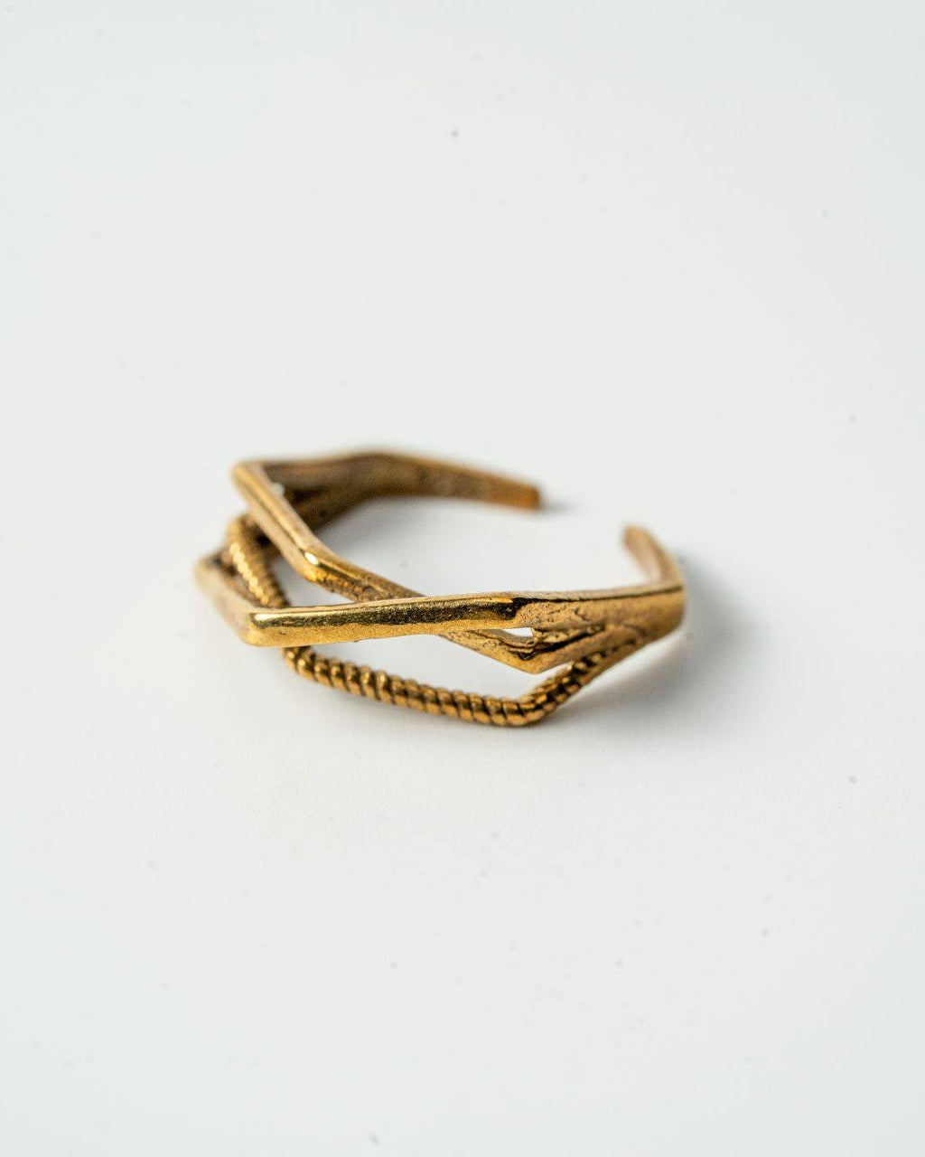 Crosswinds – Crossover Brass Ring - Adjustable size 3-5 - JUNUKA